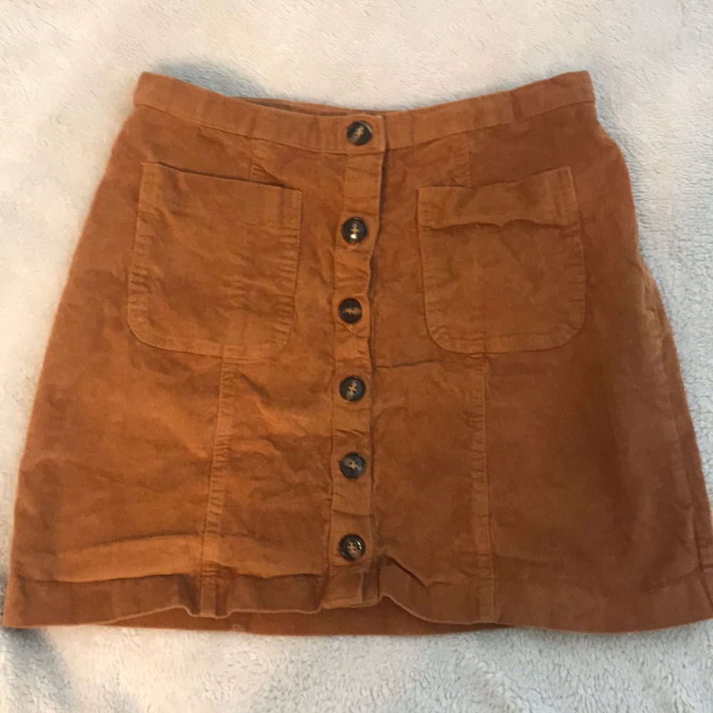 tan love and piece skirt